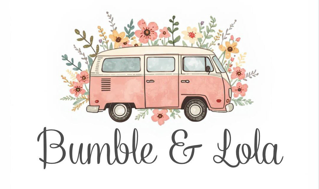 Pink vintage van with floral decorations and 'Bumble & Lola' text on a white background